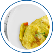 Photo of a plated omelet with a fork on the side